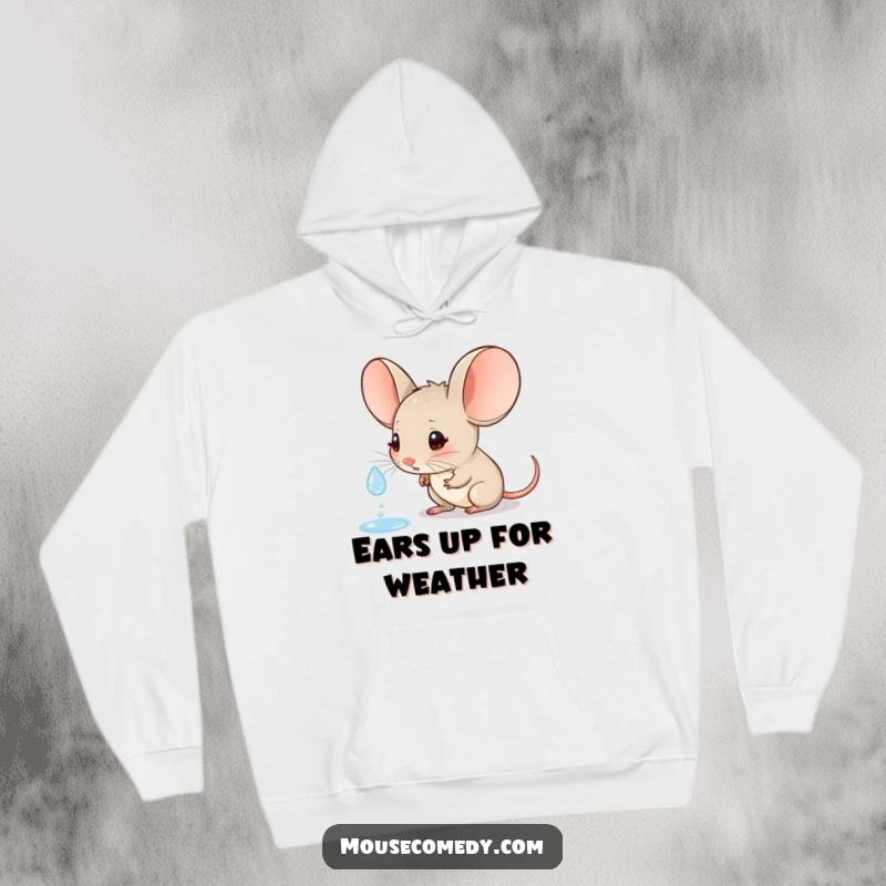 Funny hoodie with a large-eared mouse sitting peacefully, curiously watching a raindrop with a look of innocent wonder and calm.