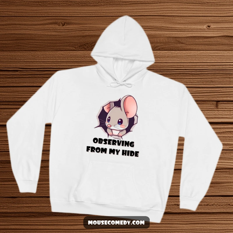 Funny hoodie design of a mouse peeking out from a minuscule hole, evoking a sense of curiosity and playful observation.