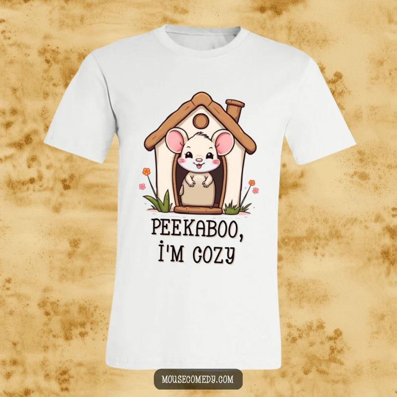 Funny t-shirt featuring a smiling mouse peeking out from a quaint miniature house, offering a glimpse of cozy curiosity.